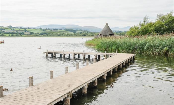 View of the Crannog Centre and the Brecon Beacons